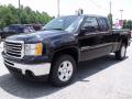 Front 3/4 View of 2011 GMC Sierra 1500 SLE All Terrain Extended Cab #3