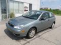 Front 3/4 View of 2006 Ford Focus ZX3 SE Hatchback #2