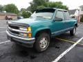 Front 3/4 View of 1995 Chevrolet C/K K1500 Silverado Z71 Extended Cab 4x4 #2