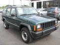 Front 3/4 View of 1999 Jeep Cherokee SE #1