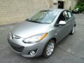 Front 3/4 View of 2011 Mazda MAZDA2 Touring #8