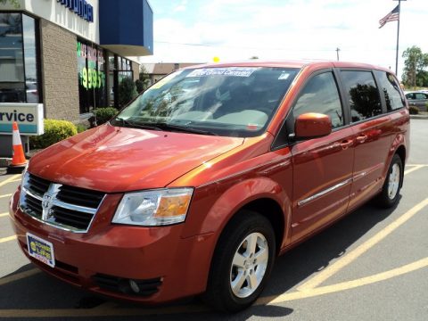 Sunburst Orange Pearl Dodge Grand Caravan SXT.  Click to enlarge.