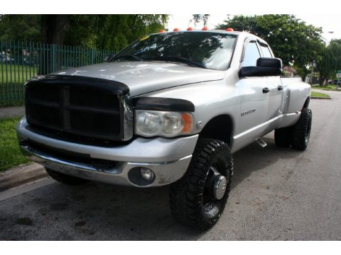 Bright Silver Metallic Dodge Ram 3500 SLT Quad Cab 4x4 Dually.  Click to enlarge.