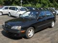 Front 3/4 View of 2004 Hyundai Elantra GT Hatchback #1