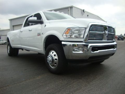 Bright White Dodge Ram 3500 HD Laramie Crew Cab 4x4 Dually.  Click to enlarge.