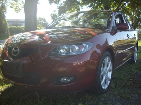 Copper Red Mica Mazda MAZDA3 i Touring Sedan.  Click to enlarge.