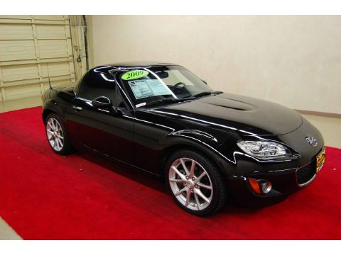 Brilliant Black Mazda MX-5 Miata Hardtop Touring Roadster.  Click to enlarge.