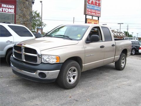 Light Almond Pearl Dodge Ram 1500 ST Quad Cab.  Click to enlarge.