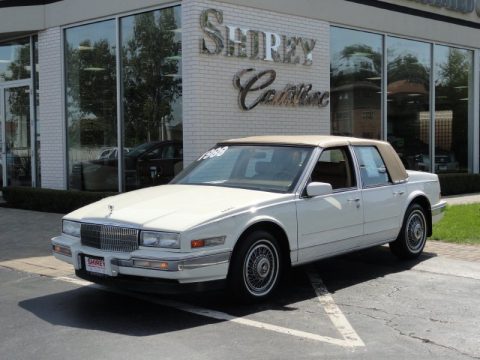 White Cadillac SeVille .  Click to enlarge.