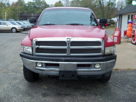 Metallic Red Dodge Ram 1500 SLT Extended Cab 4x4.  Click to enlarge.