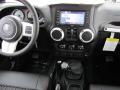 Dashboard of 2012 Jeep Wrangler Unlimited Sahara Arctic Edition 4x4 #15
