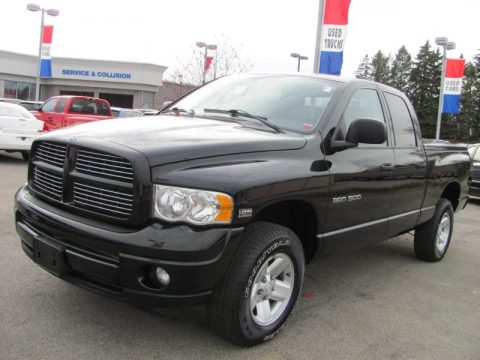 Black Dodge Ram 1500 SLT Quad Cab 4x4.  Click to enlarge.