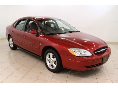 Toreador Red Metallic Ford Taurus SES.  Click to enlarge.