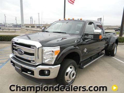 Tuxedo Black Metallic Ford F350 Super Duty Lariat Crew Cab 4x4 Dually.  Click to enlarge.