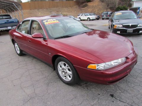 Ruby Red Metallic Oldsmobile Intrigue GL.  Click to enlarge.