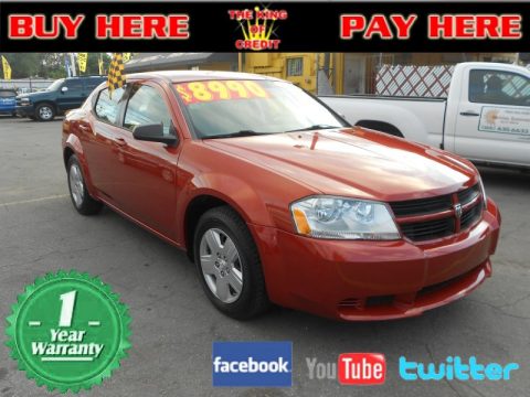 Sunburst Orange Pearl Dodge Avenger SE.  Click to enlarge.