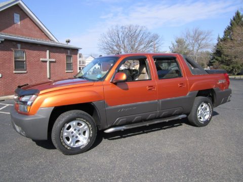 Sunburst Orange Metallic Chevrolet Avalanche 1500 Z71 4x4.  Click to enlarge.