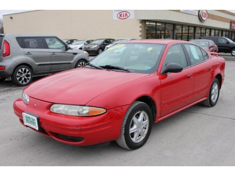 Bright Red Oldsmobile Alero GL1 Sedan.  Click to enlarge.