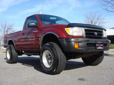 Sunfire Red Pearl Metallic Toyota Tacoma Regular Cab 4x4.  Click to enlarge.