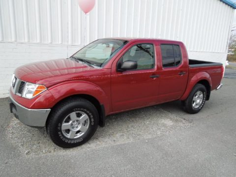 Red Brawn Nissan Frontier SE Crew Cab 4x4. Click to enlarge. Red Brawn Nissan Frontier SE Crew Cab 4x4. Click to enlarge.