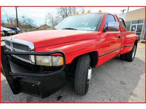 Poppy Red Dodge Ram 3500 Laramie Regular Cab Dually.  Click to enlarge.