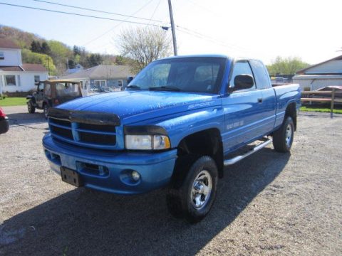 Intense Blue Pearl Dodge Ram 1500 SLT Club Cab 4x4.  Click to enlarge.