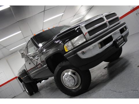 Black Dodge Ram 3500 Laramie Extended Cab 4x4 Dually.  Click to enlarge.