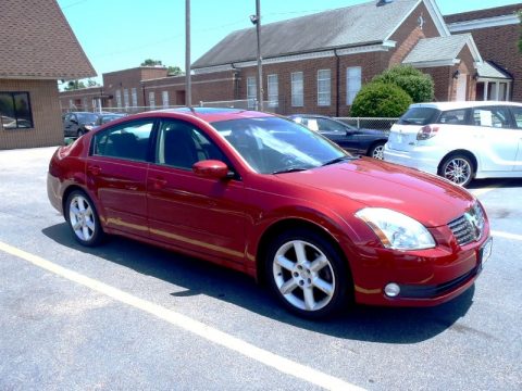 Red Opulence Metallic Nissan Maxima 3.5 SE.  Click to enlarge.