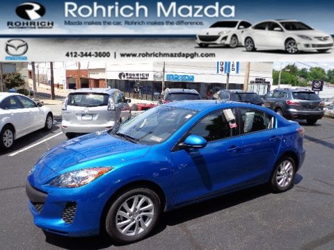 Sky Blue Mica Mazda MAZDA3 i Touring 4 Door.  Click to enlarge.