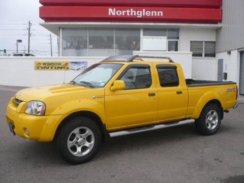Solar Yellow Nissan Frontier SC V6 Crew Cab 4x4.  Click to enlarge.
