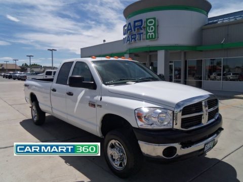 Bright White Dodge Ram 2500 SXT Quad Cab 4x4.  Click to enlarge.