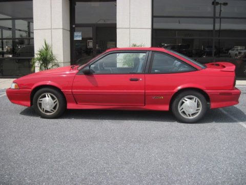Bright Red Chevrolet Cavalier Z24 Coupe.  Click to enlarge.