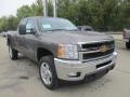 Front 3/4 View of 2013 Chevrolet Silverado 2500HD LT Extended Cab 4x4 #10