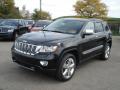 Front 3/4 View of 2013 Jeep Grand Cherokee Overland Summit 4x4 #2
