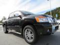 Front 3/4 View of 2012 Nissan Titan SL Heavy Metal Chrome Edition Crew Cab 4x4 #7