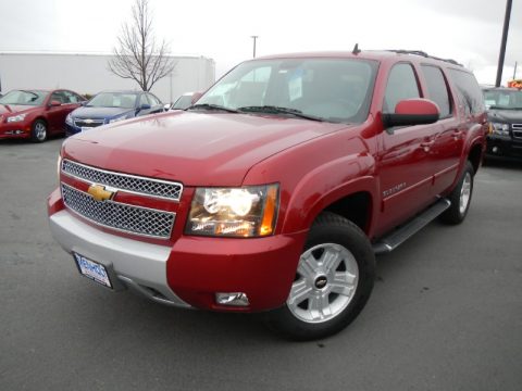 Crystal Red Tintcoat Chevrolet Suburban LT 4x4.  Click to enlarge.