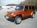 Front 3/4 View of 2011 Jeep Wrangler Unlimited Sahara 4x4 #13
