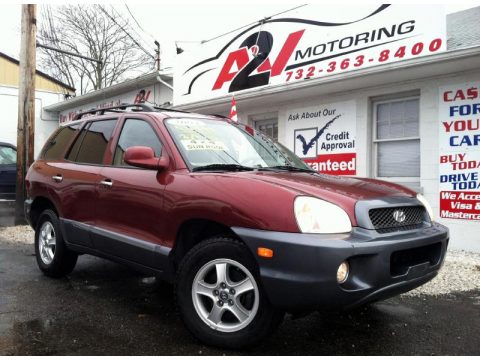 Merlot Red Hyundai Santa Fe GLS 4WD.  Click to enlarge.