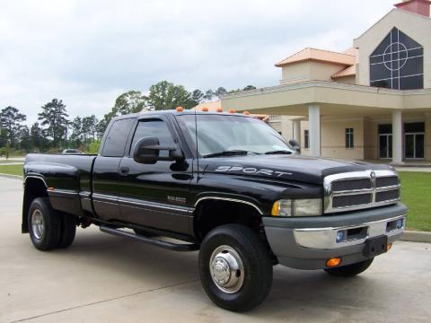 Black Dodge Ram 3500 Laramie Extended Cab 4x4 Dually.  Click to enlarge.