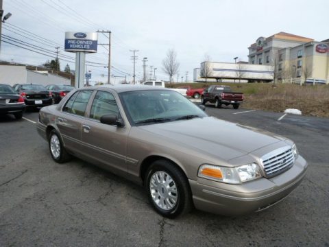 Arizona Beige Metallic Ford Crown Victoria LX.  Click to enlarge.