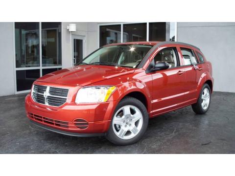 Sunburst Orange Pearl 2009 Dodge Caliber SXT with Pastel Pebble Beige Sunburst Orange Pearl 2009 Dodge Caliber SXT with Pastel Pebble Beige