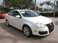 Front 3/4 View of 2010 Volkswagen Jetta Wolfsburg Edition Sedan #7