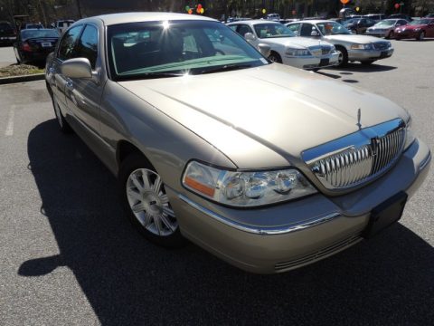 Light French Silk Metallic Lincoln Town Car Signature Limited.  Click to enlarge.