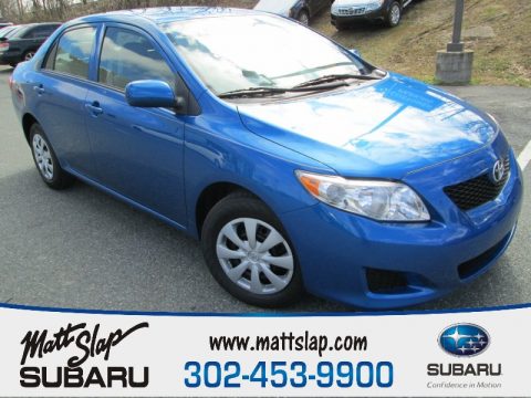 Blue Streak Metallic Toyota Corolla LE.  Click to enlarge.