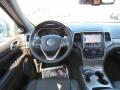 Dashboard of 2014 Jeep Grand Cherokee Summit #9