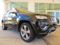 Front 3/4 View of 2014 Jeep Grand Cherokee Overland 4x4 #4