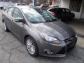 Front 3/4 View of 2013 Ford Focus Titanium Sedan #2