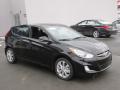 Front 3/4 View of 2013 Hyundai Accent SE 5 Door #3