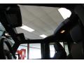 Sunroof of 2013 Jeep Wrangler Unlimited Oscar Mike Freedom Edition 4x4 #16