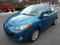 Front 3/4 View of 2011 Mazda MAZDA2 Touring #6 Front 3/4 View of 2011 Mazda MAZDA2 Touring #6